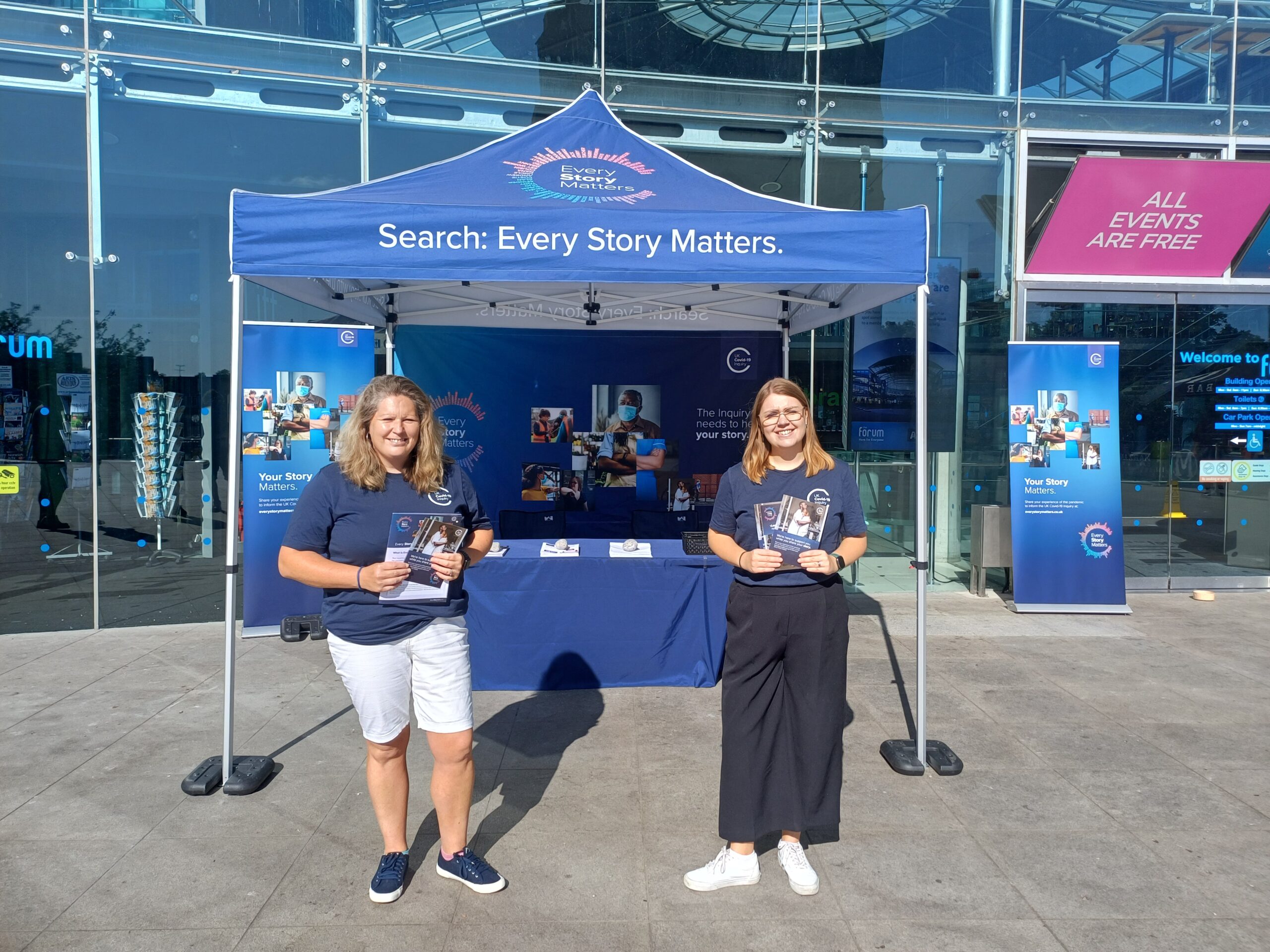 Inquiry staff at an outdoor Every Story Matters event