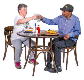 two friends sitting at a cafe table